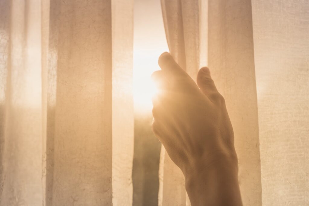 Hand opening window curtains - The Gestalt Clinic